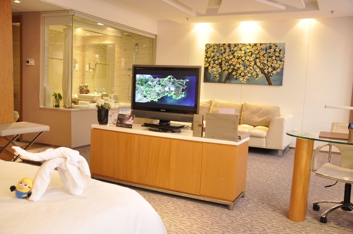 Imagen de la habitación del Hotel The Brigh Radiance Weihai. Foto 12