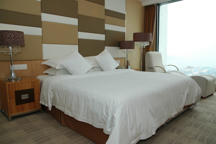 Imagen de la habitación del Hotel The Brigh Radiance Weihai. Foto 15