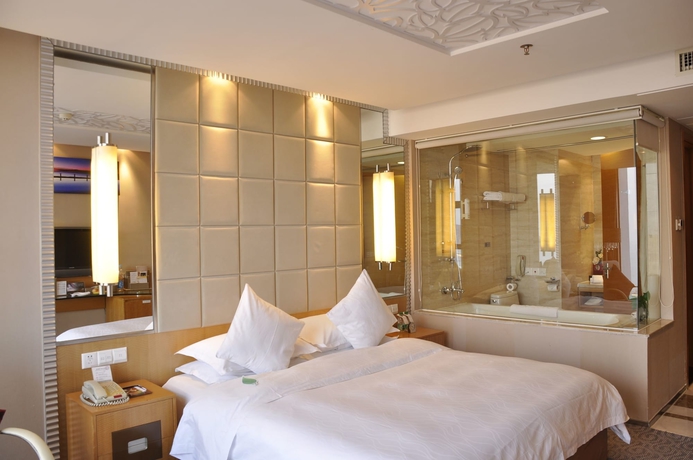 Imagen de la habitación del Hotel The Brigh Radiance Weihai. Foto 16