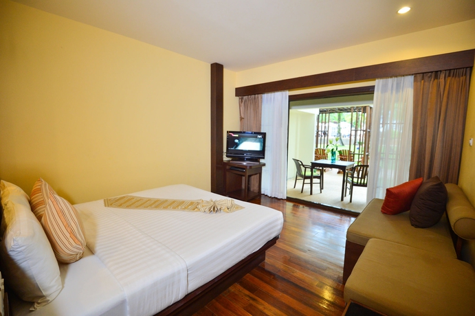 Imagen de la habitación del Hotel The Briza Beach Resort Khaolak - Sha Extra Plus. Foto 7