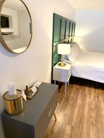 Imagen de la habitación del Hotel The Brooks. Foto 8