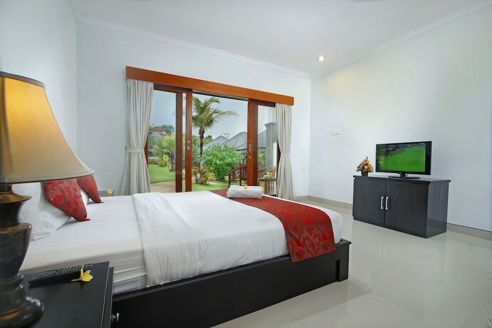 Imagen de la habitación del Hotel The Brothers Villas Padang Padang. Foto 17