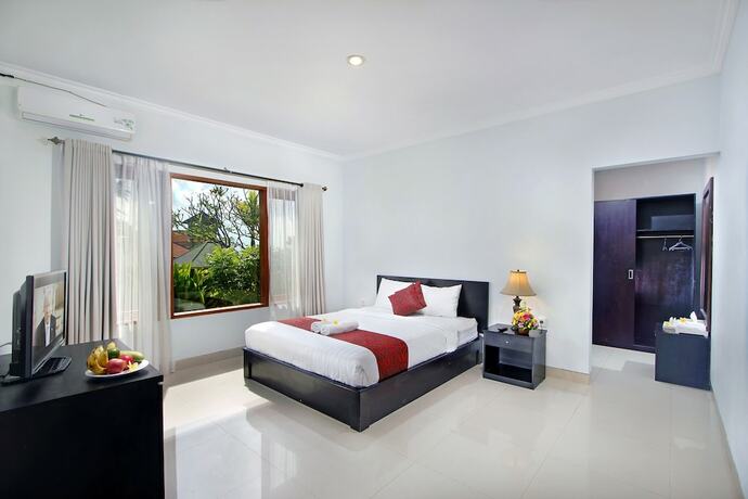 Imagen de la habitación del Hotel The Brothers Villas Padang Padang. Foto 18