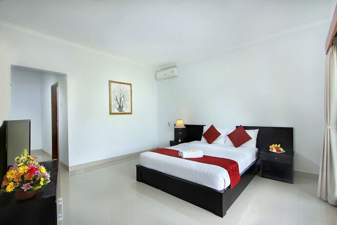 Imagen de la habitación del Hotel The Brothers Villas Padang Padang. Foto 19