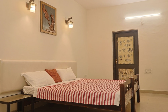 Imagen de la habitación del Hotel The Brownwood Manor. Foto 12