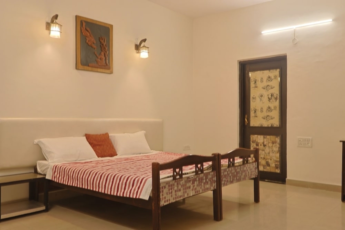 Imagen de la habitación del Hotel The Brownwood Manor. Foto 13