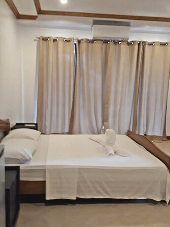 Imagen de la habitación del Hotel The Bruce Resort. Foto 31