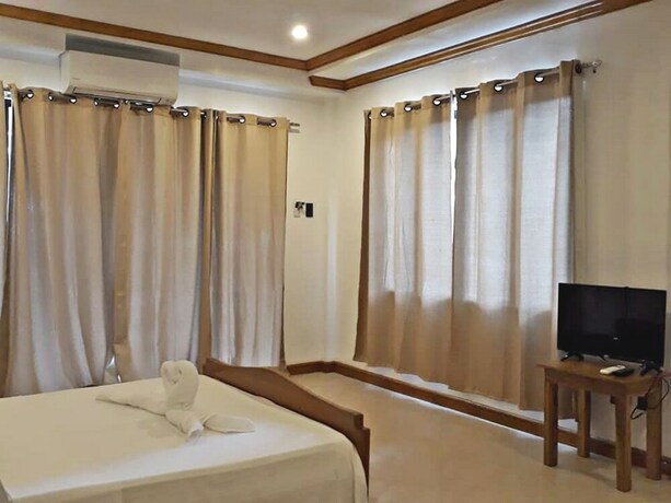 Imagen de la habitación del Hotel The Bruce Resort. Foto 33