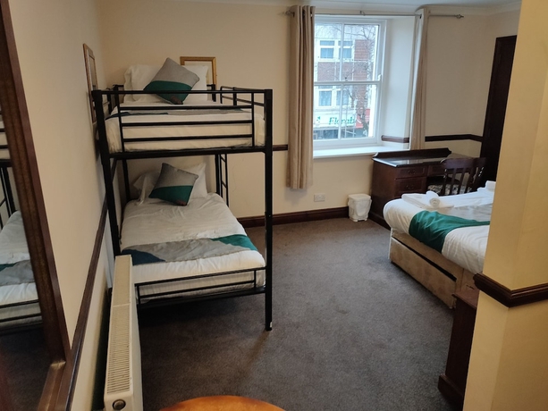 Imagen de la habitación del Hotel The Brunel. Foto 2