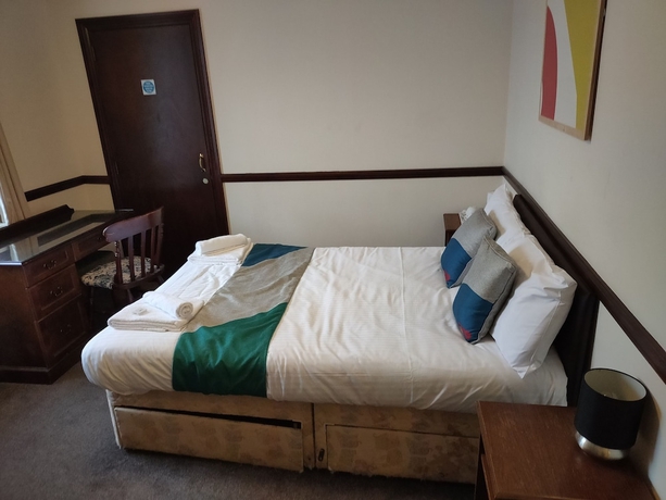 Imagen de la habitación del Hotel The Brunel. Foto 3
