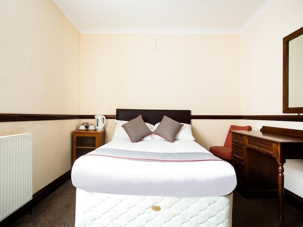 Imagen de la habitación del Hotel The Brunel. Foto 9