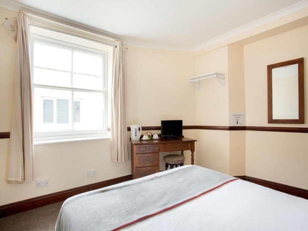 Imagen de la habitación del Hotel The Brunel. Foto 12