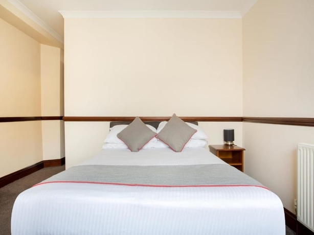 Imagen de la habitación del Hotel The Brunel. Foto 13