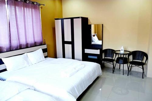 Imagen de la habitación del Hotel The Bua Boutique Resort. Foto 18