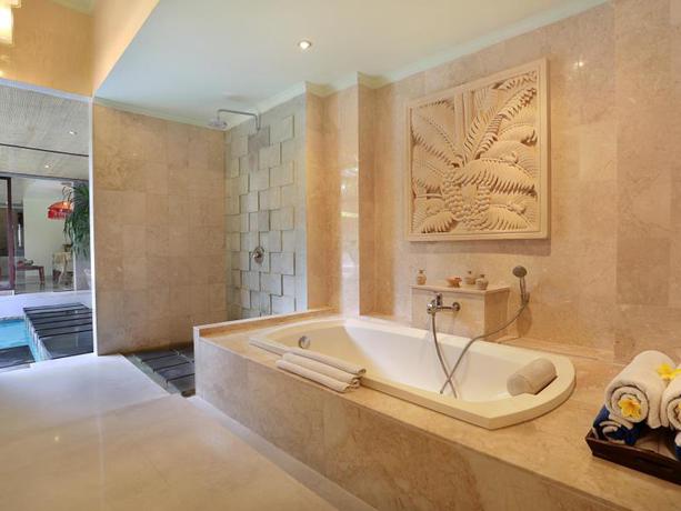 Imagen de la habitación del Hotel The Buah Bali Villas. Foto 6