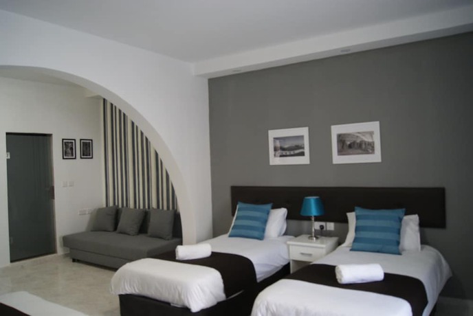 Imagen de la habitación del Hotel The Buccaneers Boutique Guest House. Foto 2