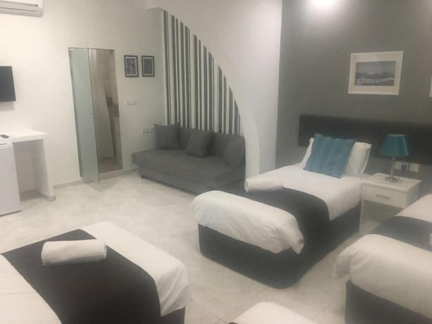 Imagen de la habitación del Hotel The Buccaneers Boutique Guest House. Foto 9