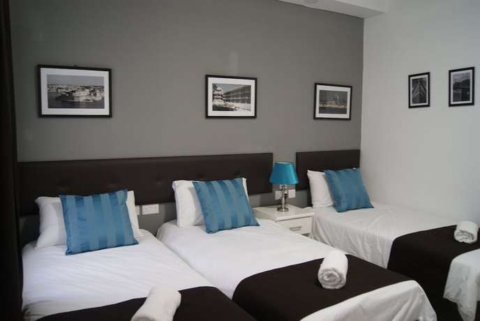 Imagen de la habitación del Hotel The Buccaneers Boutique Guest House. Foto 16