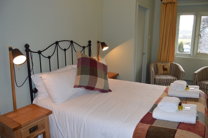 Imagen de la habitación del Hotel The Buck Inn. Foto 5