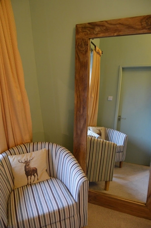 Imagen de la habitación del Hotel The Buck Inn. Foto 6