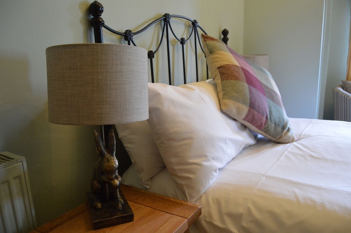 Imagen de la habitación del Hotel The Buck Inn. Foto 8