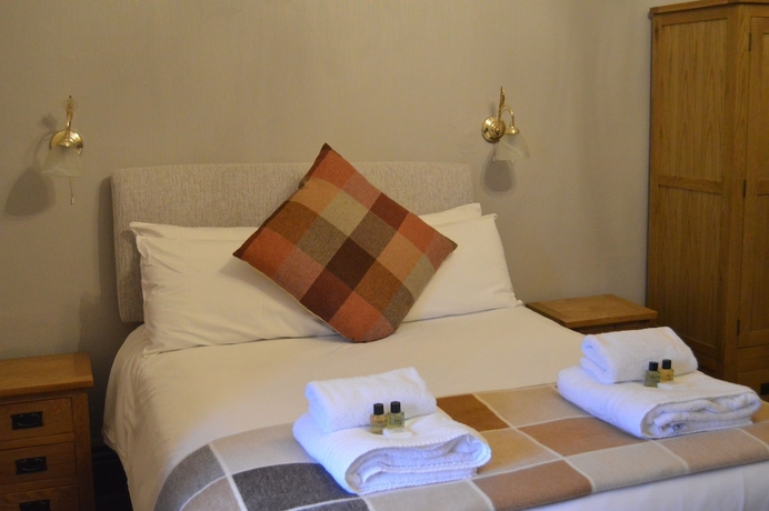 Imagen de la habitación del Hotel The Buck Inn. Foto 9