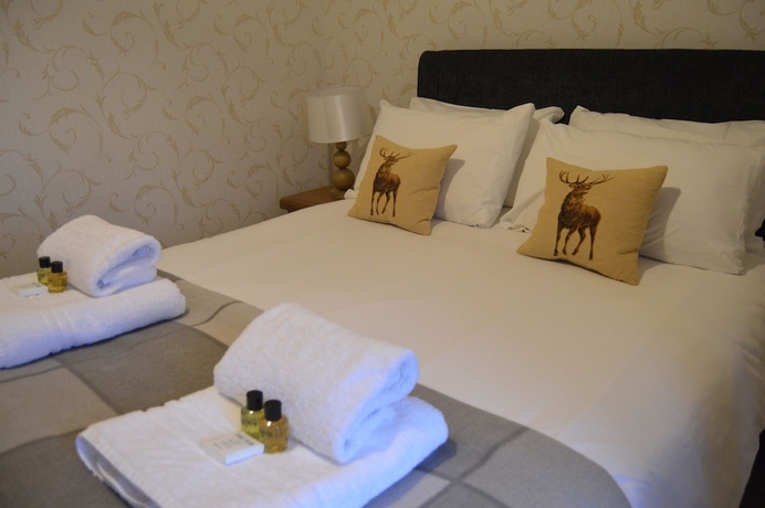 Imagen de la habitación del Hotel The Buck Inn. Foto 10