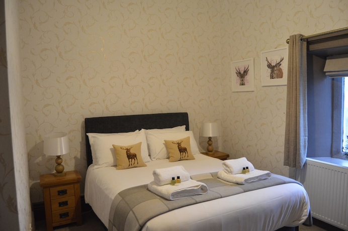 Imagen de la habitación del Hotel The Buck Inn. Foto 13