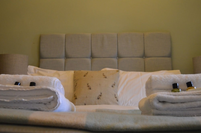 Imagen de la habitación del Hotel The Buck Inn. Foto 17