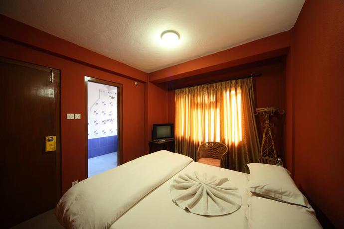 Imagen de la habitación del Hotel The Buddha Garden. Foto 5