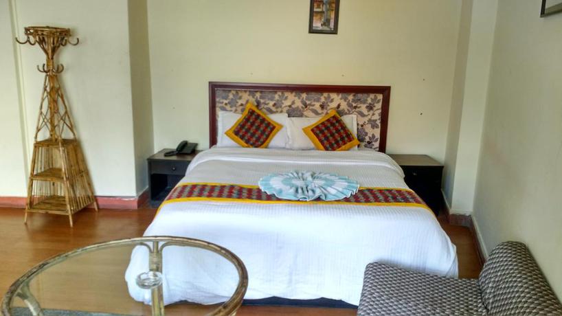 Imagen de la habitación del Hotel The Buddha Garden. Foto 7