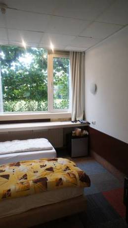 Imagen de la habitación del Hotel The Budget. Foto 9