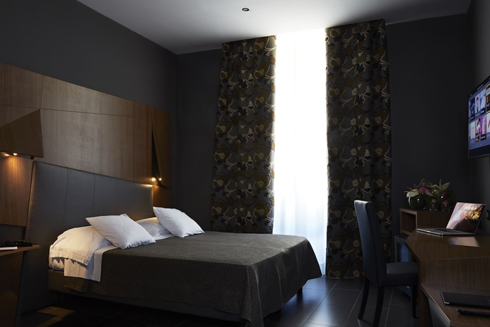 Imagen de la habitación del Hotel The Building. Foto 5