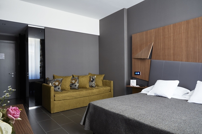 Imagen de la habitación del Hotel The Building. Foto 6