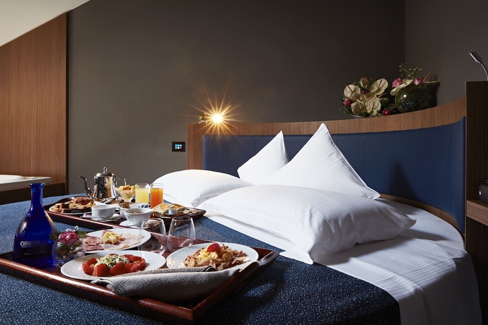 Imagen de la habitación del Hotel The Building. Foto 8