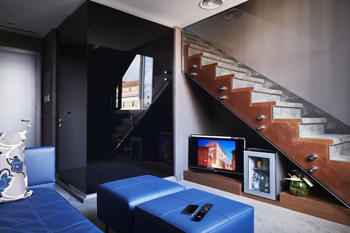 Imagen de la habitación del Hotel The Building. Foto 9