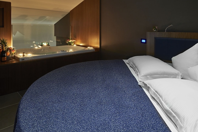 Imagen de la habitación del Hotel The Building. Foto 14