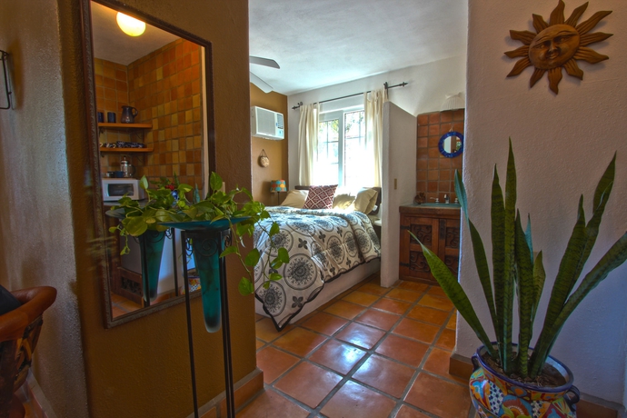 Imagen de la habitación del Hotel The Bungalows. Foto 5