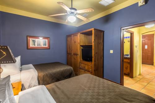 Imagen de la habitación del Hotel The Bungalows On Shary. Foto 9