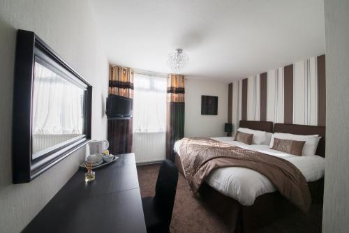 Imagen de la habitación del Hotel The Burnside. Foto 9