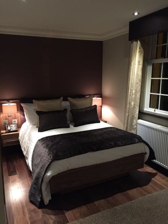 Imagen de la habitación del Hotel The Busby. Foto 11