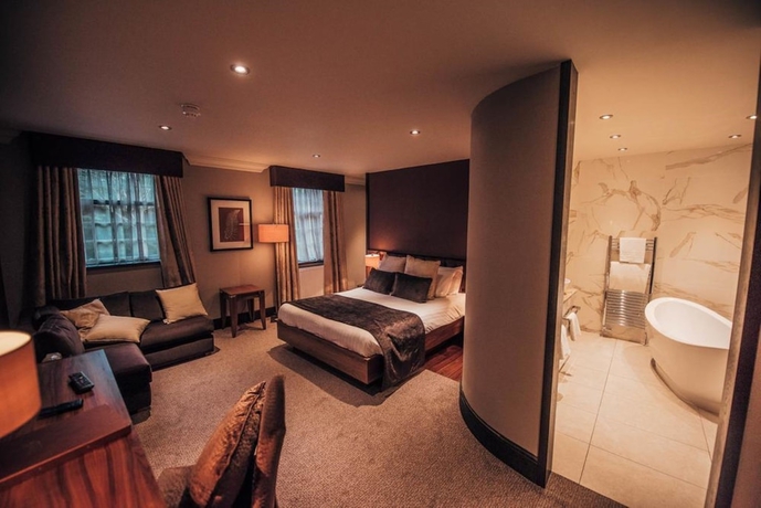 Imagen de la habitación del Hotel The Busby. Foto 17