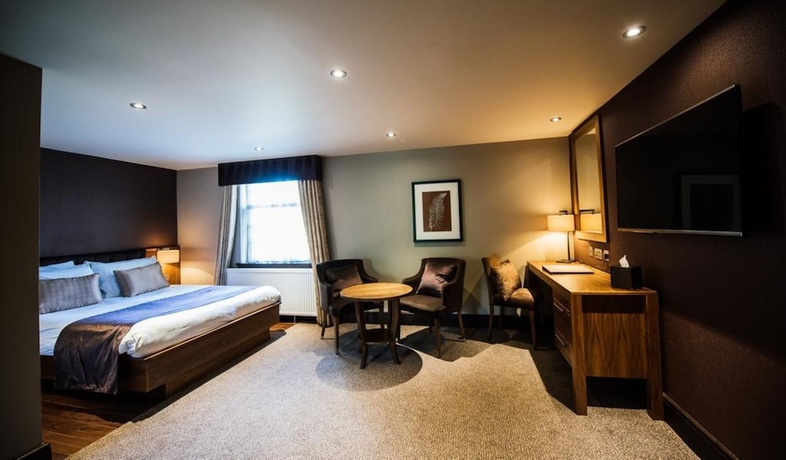 Imagen de la habitación del Hotel The Busby. Foto 18