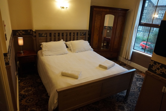 Imagen de la habitación del Hotel The Butlers. Foto 4