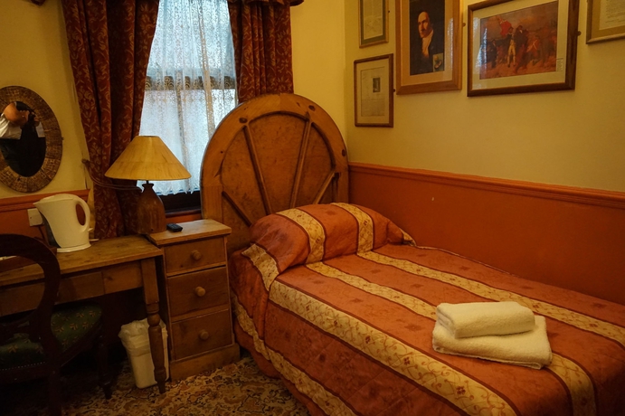 Imagen de la habitación del Hotel The Butlers. Foto 6