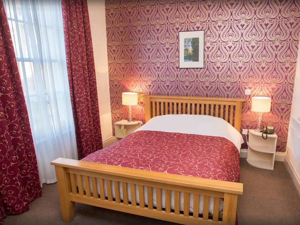 Imagen de la habitación del Hotel The Buttery. Foto 7