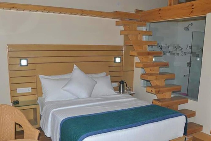 Imagen de la habitación del Hotel The Byke Nature Vilas Pure Veg. Foto 13
