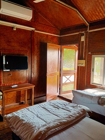 Imagen de la habitación del Hotel The Byke Niranjana Resort. Foto 9