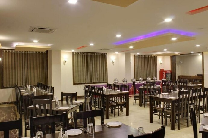 Imagen del bar/restaurante del Hotel The Byke Riddhi Inn. Foto 17