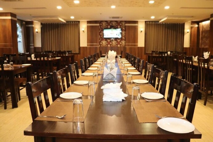 Imagen del bar/restaurante del Hotel The Byke Riddhi Inn. Foto 19